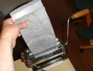 Repurposing and recycling an old pasta machine into a portable printing press